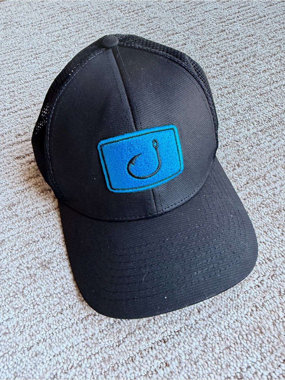 Black Trucker Hat with Blue Fishing Hook Patch
